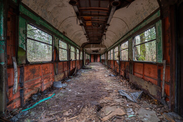 Fototapeta na wymiar Interior of an old destroyed train wagon