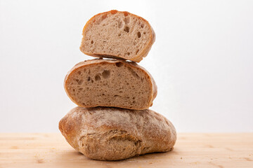 A stack of homemade bread with light background