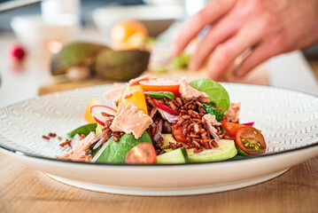 red rice with vegetables and tuna