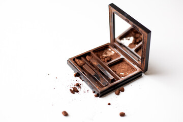 Brown eyeshadow palette, isolated on a white background.