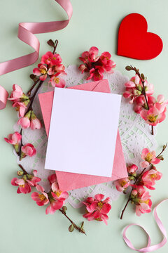 happy valentine's day greeting card mockup. red heart, flowers and envelope