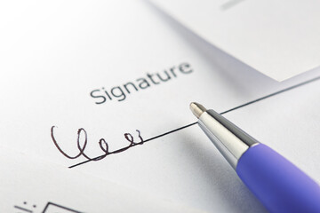 signature of contract and agreement, accounting document with pen. Concept of banking, financial report and financial audit.