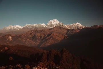 Papier Peint photo Dhaulagiri Himalayan mountain peak Annapurna Range during sunrise.
