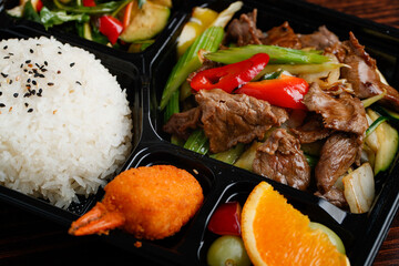 Chinese food box with meat and rice
