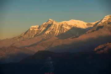 Naklejka na ściany i meble Himalayan mountain Dhaulagiri peak during sunrise in Nepal.
