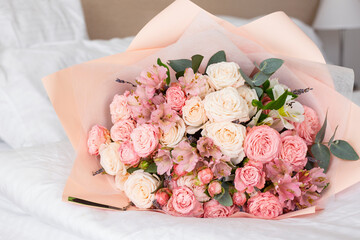 bouquet of flowers on the bed, gift, women's day