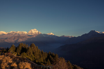 Obraz premium Himalayan mountain Dhaulagiri peak during sunrise in Nepal.