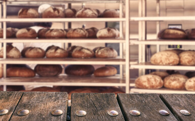 Empty wooden deck table on blurry bakery background. Can be used for mockup products displays