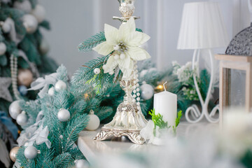 Christmas tree with  white and blue toys in the interior.  Christmas  white and blue decor