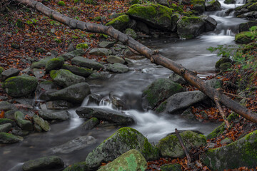 Fototapeta premium Waterfall on Bucaci creek in Moravskoslezske Beskydy mountains in winter day