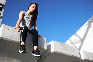 woman on ledge depression or suicide concept