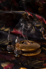 Agarwood, also called aloeswood, essential oil and burning incense chips