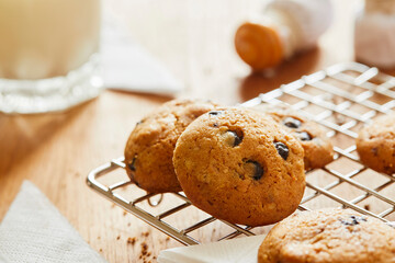 Choco cookies with making products on table.