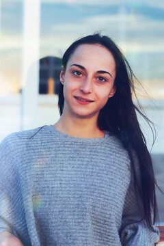 portrait young latin woman looking at camera