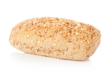 long loaf of multigrain whole wheat bread on white background.