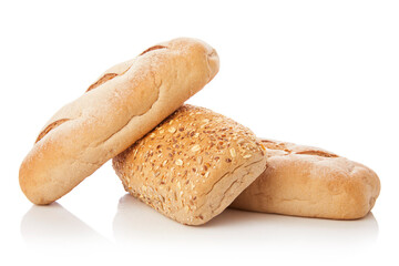long loaf of multigrain whole wheat bread on white background.
