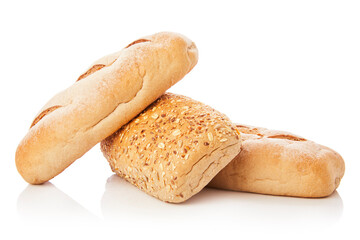 long loaf of multigrain whole wheat bread on white background.