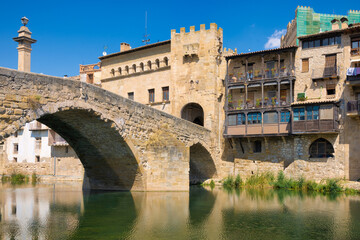Obraz na płótnie Canvas View from Rio Matarranya the medieval bridge that gives access to the historic center of Valderrobres, Aragon, Spain