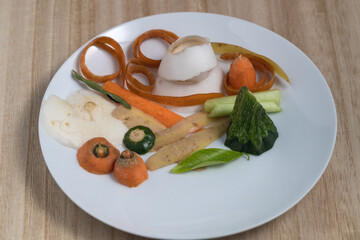 vegetable scrap in porcelain dish