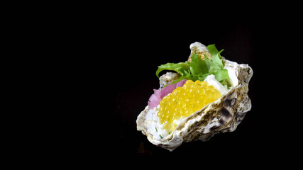 river trout caviar on cheese mousse in an oyster shell
