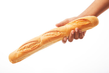 Hand holds a long loaf of bread on white.