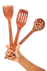 Human holding kitchen utensils isolated on white background.