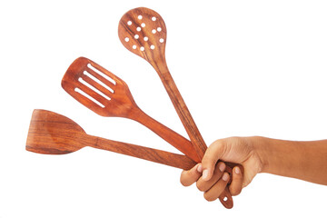 Human holding kitchen utensils isolated on white background.