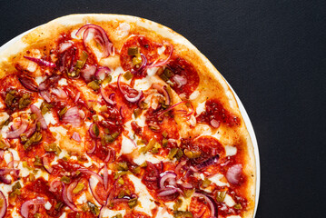 tasty pizza on the black background