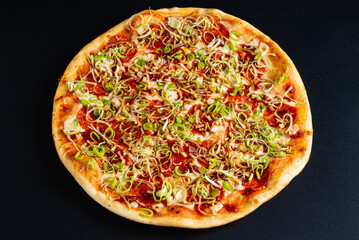 tasty pizza on the black background