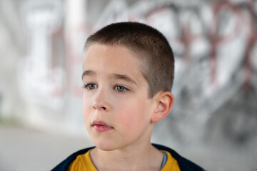 Portrait of a boy with a waiting expression