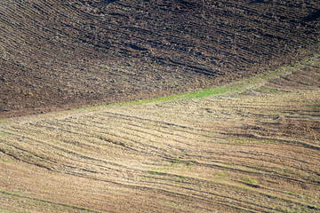 Textures of freshly cultivated brown fields
