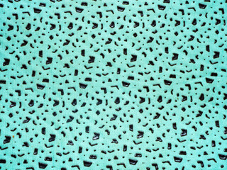 Light blue indigo texture of small specks and matter