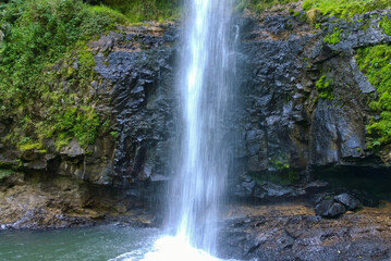 Fototapeta na wymiar Scenic waterfall in the Ragia forest, Aberdares, Kenya