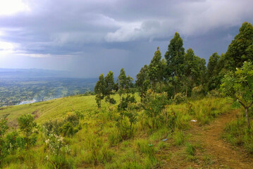 Fototapeta premium Rual landscape with storm clouds approaching, Nakuru, Kenya