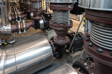 several water pumps and thermally insulated pipes