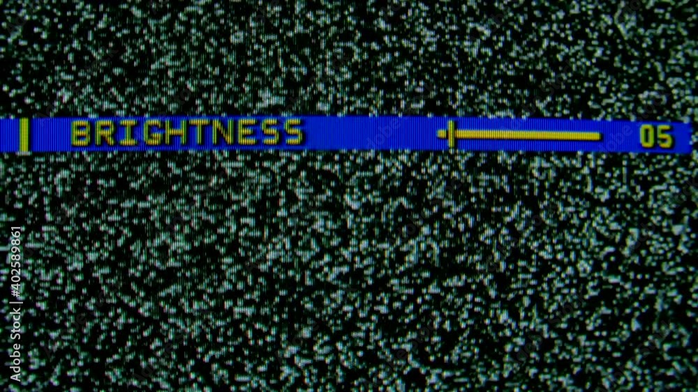 Poster settings menu on an old tv. brightness adjustment. abstract noise of analog television. damage to th