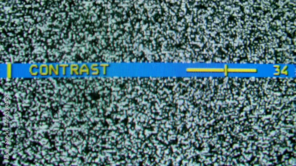 Poster settings menu on an old tv. contrast adjustment. abstract noise of analog television. damage to the 
