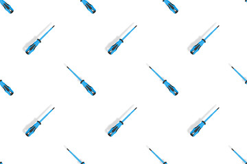 Screwdrivers seamless pattern. Metal screwdrivers with a rubberized handle on a white background.