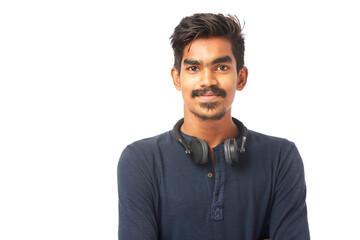 Portrait of a happy young man with headphone on white.