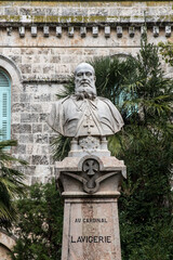 JERUSALEM, ISRAEL - January 28, 2020:  The monument to Cardinal Lavigerie in shady garden of St Anne Church, located at the beginning of Via Dolorosa in Muslim Quarter,