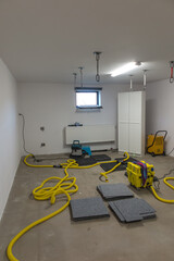 Drying a concrete floor under a fabric covering. After pouring, initial drying, and then drilling...