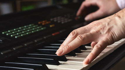 Fototapeta na wymiar Female musician playing the digital piano or electronic keyboard at home. Music Education and Entertainment. Online music lessons.Soft selective focus