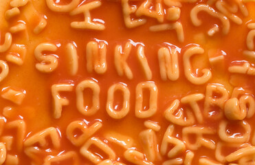 Message spelled out in pasta shapes