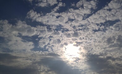 Sun in the Middle of a Group of Clouds