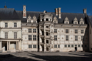 Fototapeta na wymiar Façade of Blois Castle on the banks of the Loire in France 