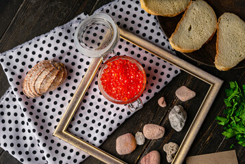 Chum salmon caviar in a glass bowl . Seafood, delicacies, healthy nutrition. 