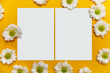 Greeting cards mockup with chamomile. Empty postcards with space for text. Bright trendy color yellow background. Template with cards and daisies. Atmospheric moments.