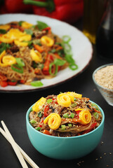 Japchae, a sweet and savory dish of stir-fried glass noodles, Korean cuisine