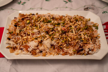 Platter of persian jeweled rice at a holiday table