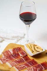 Spanish tapas, iberian loin, sausage. Iberian Acorn Ham and red wine